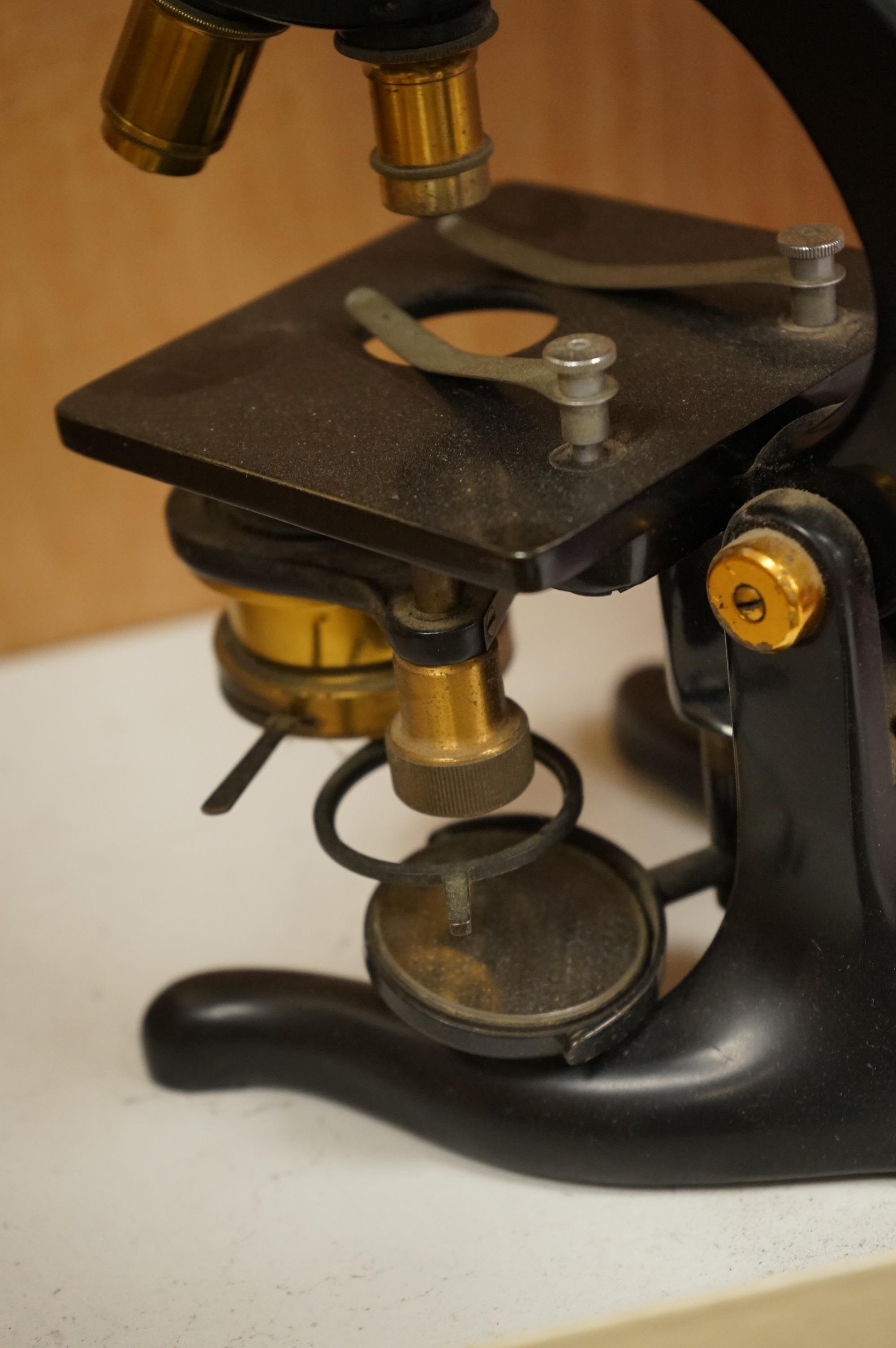 A parchment Indenture of Apprenticeship as a Surgeon and Apothecary between Nicholas Adams and Robert Seymour Adams of Hampshire, dated 1849, an early 20th century monocular brass microscope by W. Watson & Sons, 31cm hig
